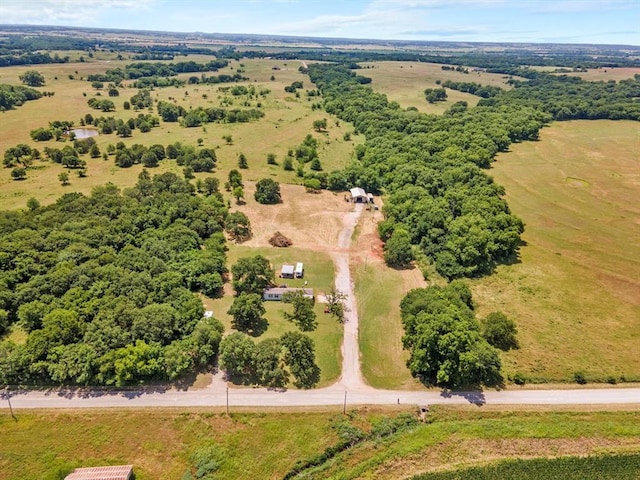 birds eye view of property featuring a rural view