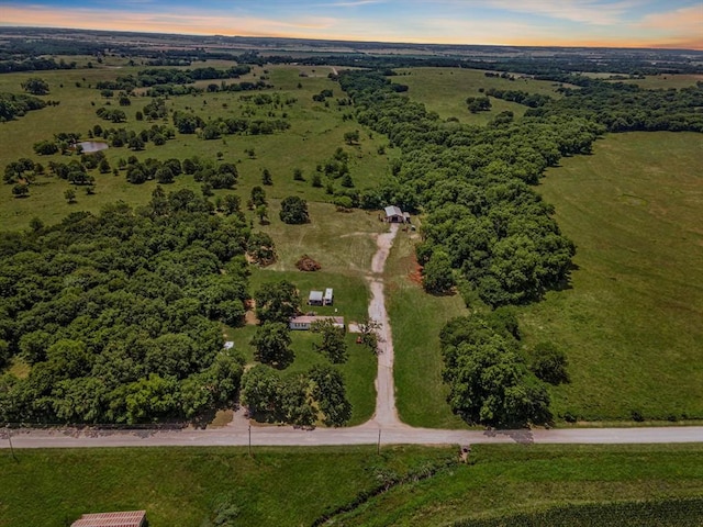 aerial view at dusk with a rural view