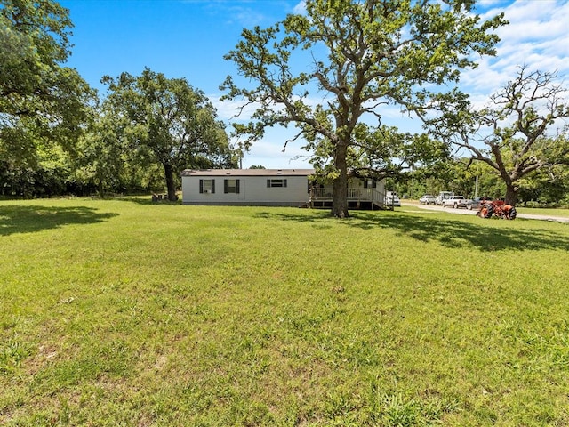 view of yard featuring a deck