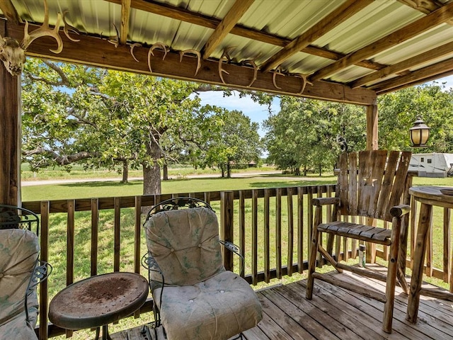 deck featuring a lawn