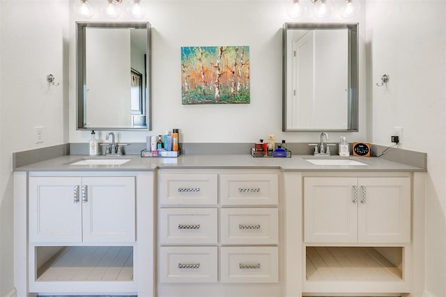 bathroom with tile patterned flooring and vanity