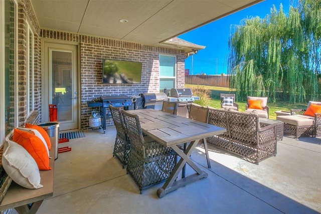 view of patio / terrace featuring outdoor lounge area and a grill