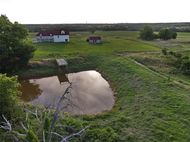 bird's eye view featuring a rural view and a water view