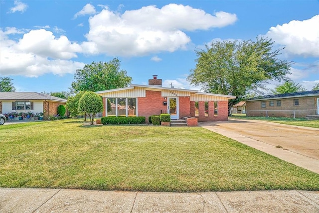 ranch-style house with a front lawn