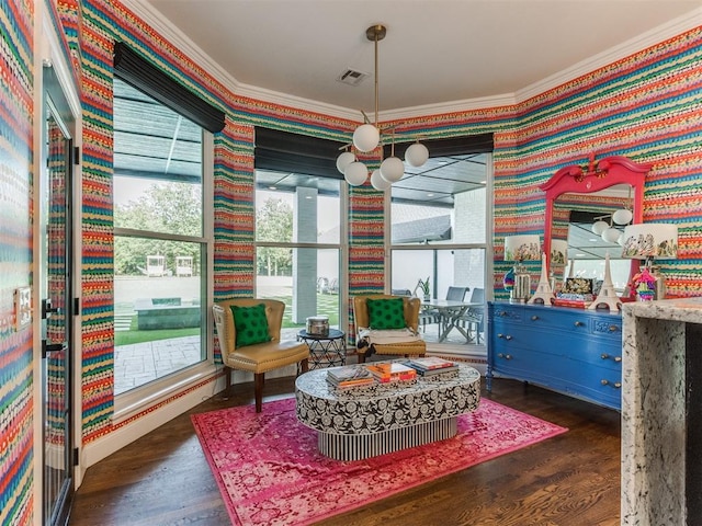 living area with ornamental molding and dark wood-type flooring