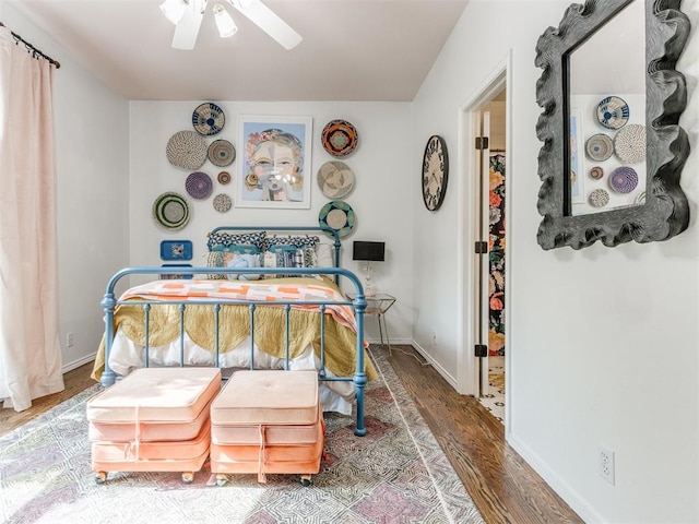 bedroom with ceiling fan and wood-type flooring