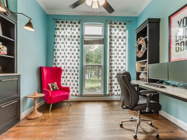 office area featuring crown molding, ceiling fan, and hardwood / wood-style flooring