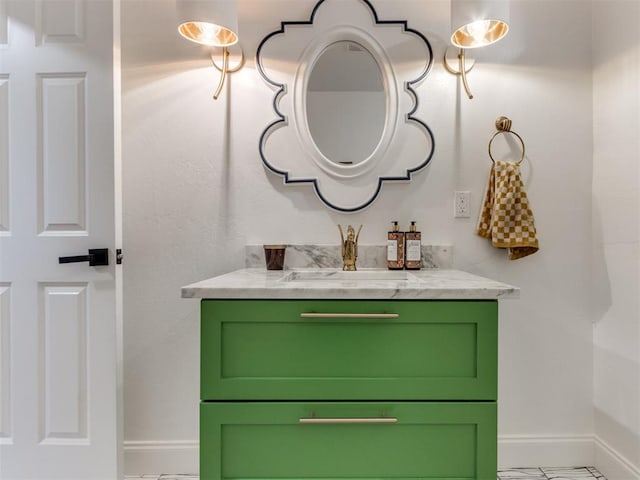 bathroom featuring tile patterned floors and vanity