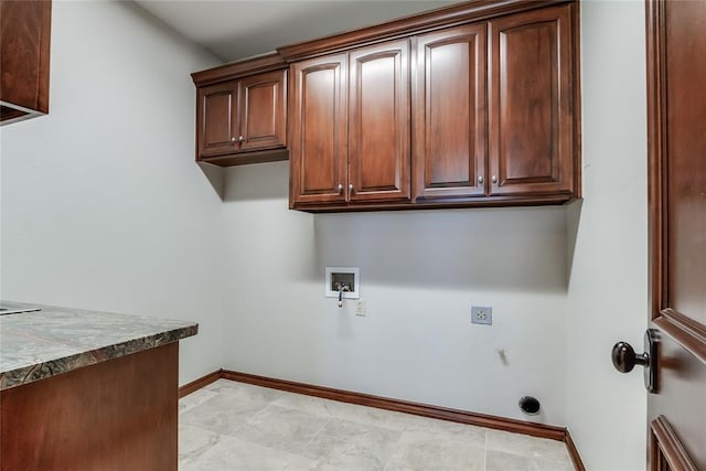 laundry area with cabinets, washer hookup, and hookup for an electric dryer