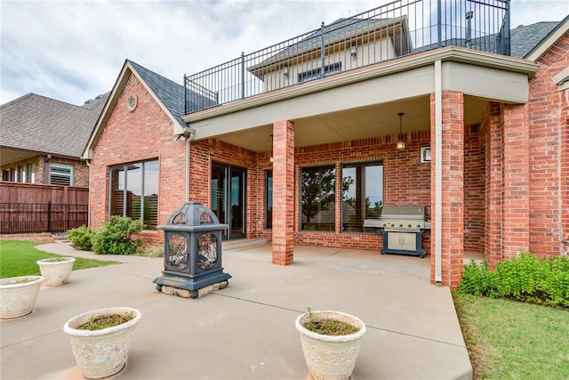 view of patio / terrace featuring a balcony and grilling area