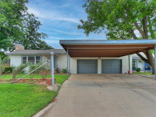 ranch-style home with a front yard and a garage