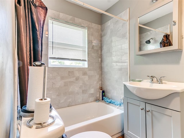 full bathroom with vanity, toilet, and shower / bath combo