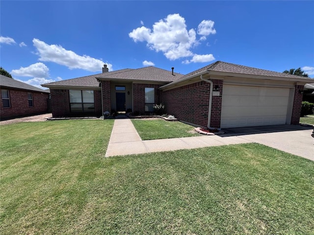 single story home featuring a front yard and a garage