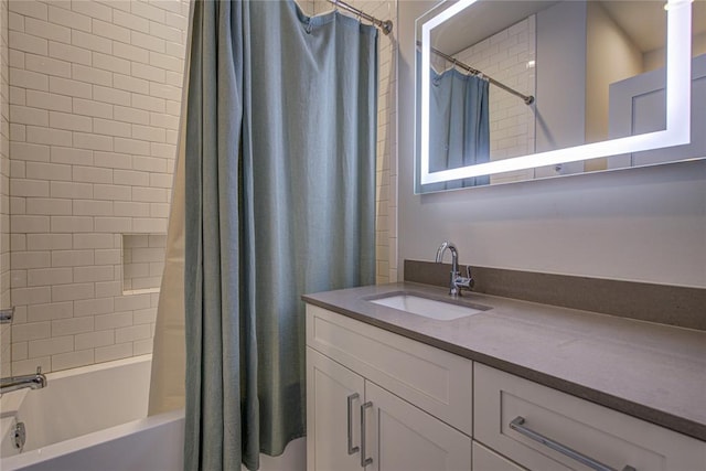 bathroom with vanity and shower / bath combo with shower curtain