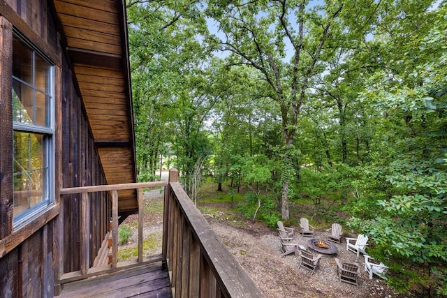 deck with an outdoor fire pit