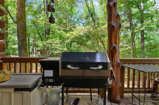 wooden terrace with area for grilling