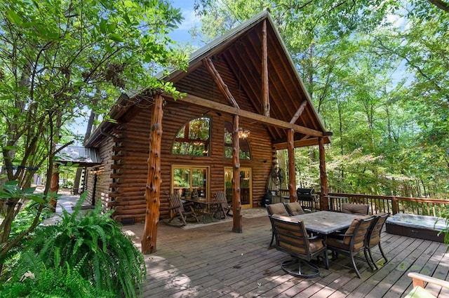 wooden terrace with a jacuzzi