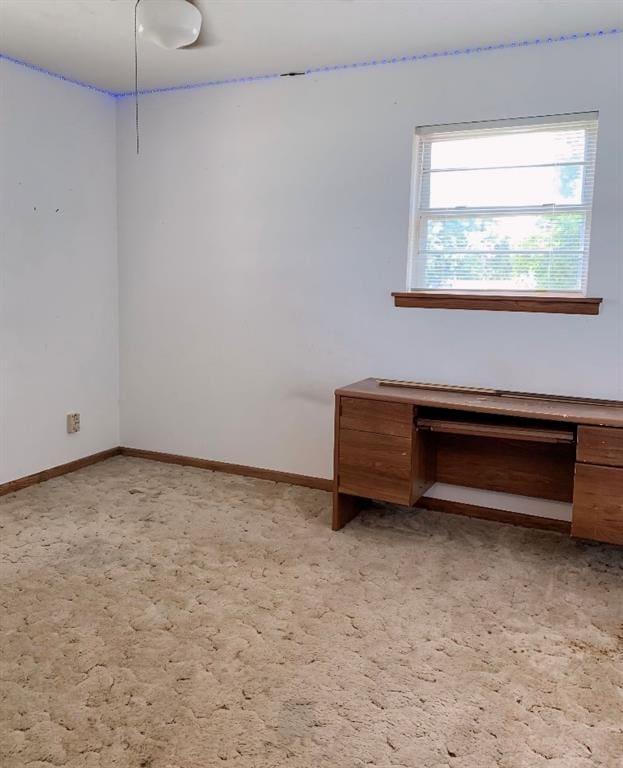 spare room with light carpet