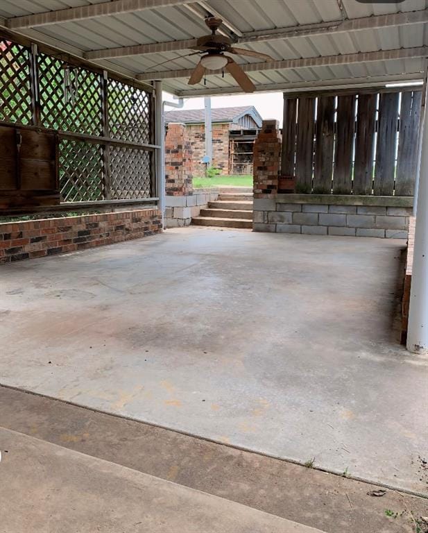 view of patio featuring ceiling fan