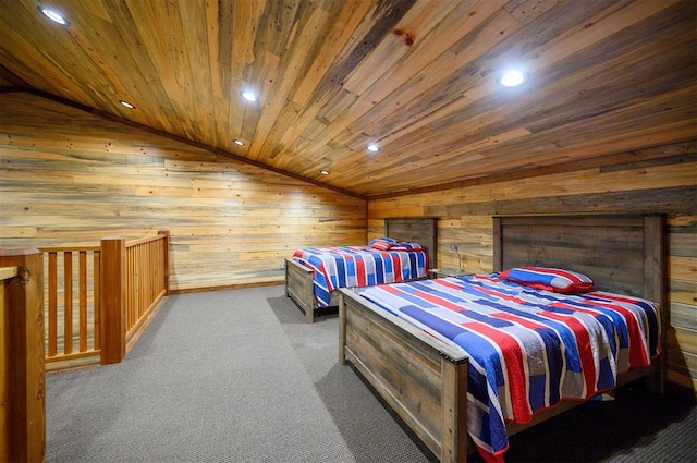 bedroom featuring lofted ceiling, carpet floors, wooden ceiling, and wood walls