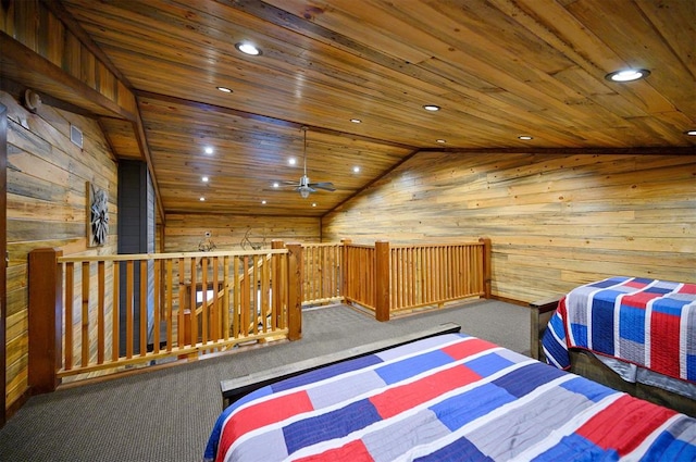 carpeted bedroom featuring vaulted ceiling, wood ceiling, and wooden walls