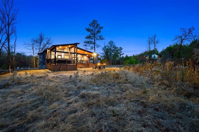 exterior space featuring a wooden deck