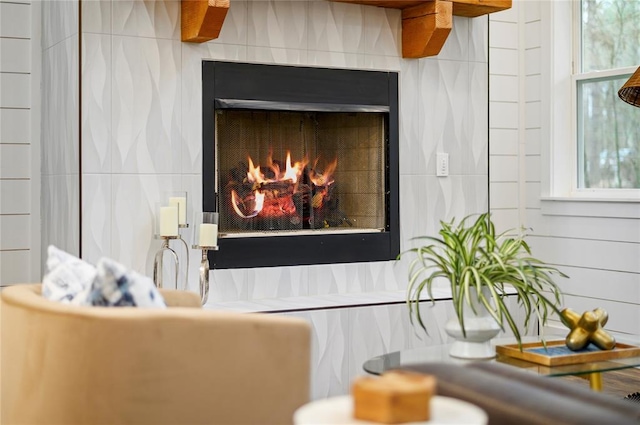 interior details with a tiled fireplace