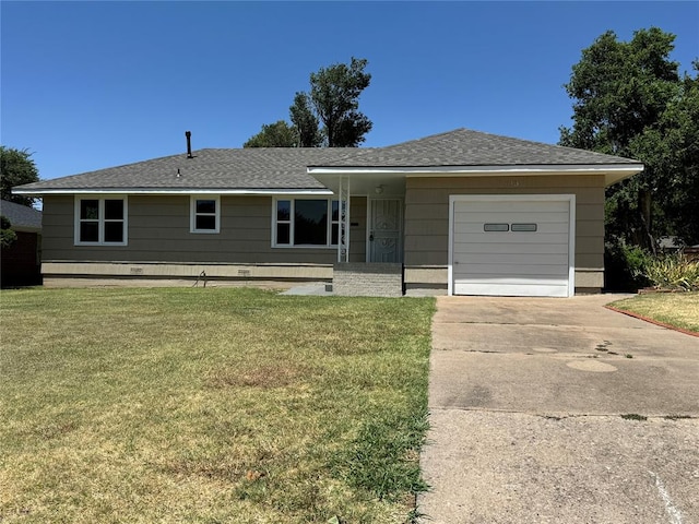 ranch-style house with a garage and a front lawn