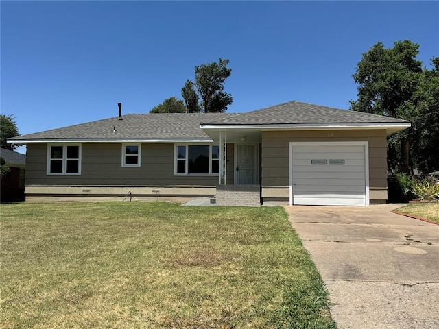 single story home featuring a garage and a front lawn