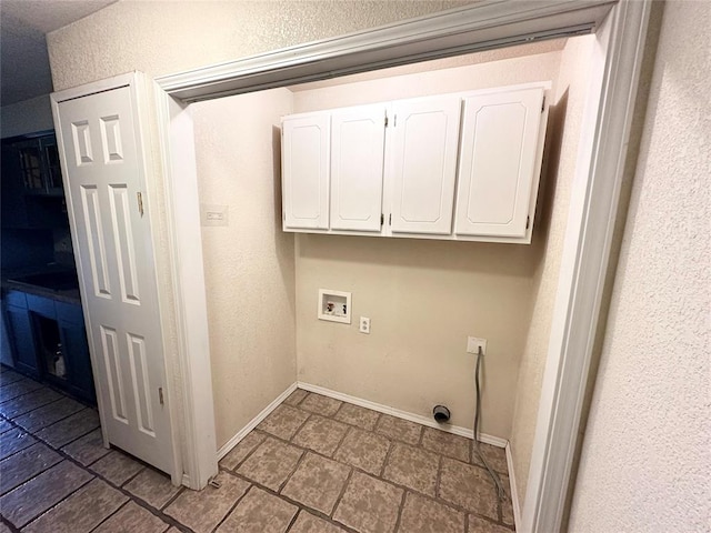 clothes washing area featuring washer hookup