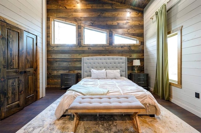 bedroom featuring dark wood-type flooring, wood ceiling, vaulted ceiling, and wood walls