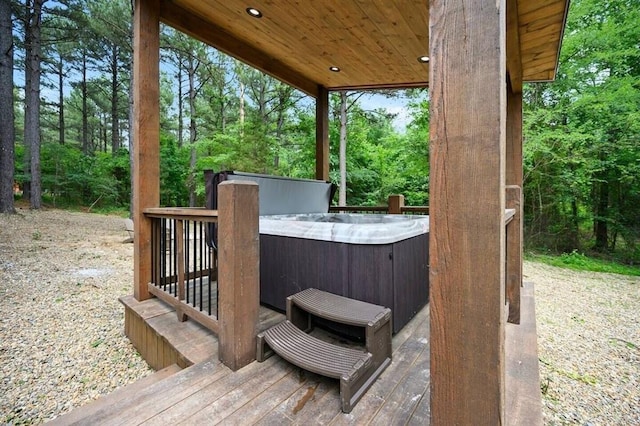 deck with a hot tub