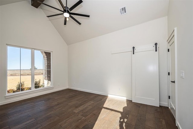 spare room featuring high vaulted ceiling, ceiling fan, and dark wood-type flooring