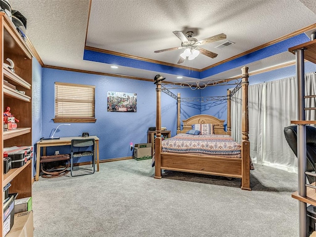 carpeted bedroom featuring a textured ceiling, ceiling fan, and crown molding