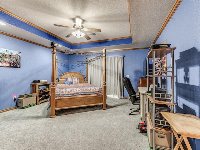 bedroom with ceiling fan, ornamental molding, a textured ceiling, and carpet floors