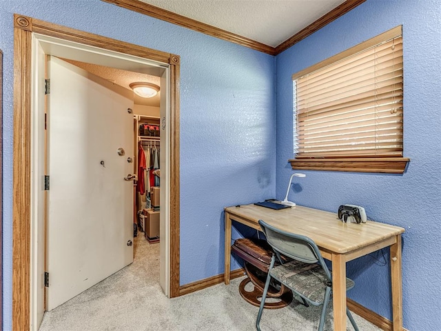 home office with crown molding, light colored carpet, and a textured ceiling