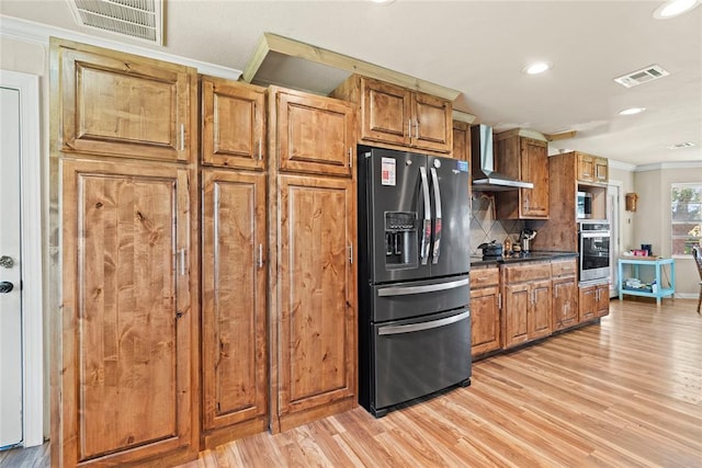 422502 E 1100th Rd, Checotah, OK 74426 - kitchen with appliances with stainless steel finishes, wall chimney exhaust hood, ornamental molding, light wood finished floors, and recessed lighting