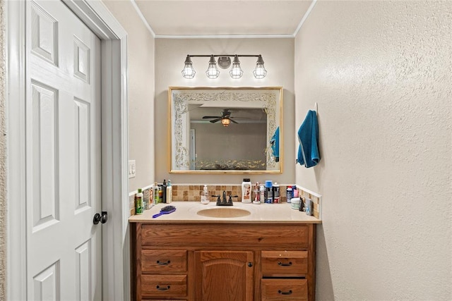 422502 E 1100th Rd, Checotah, OK 74426 - bathroom with a ceiling fan, vanity, backsplash, and crown molding