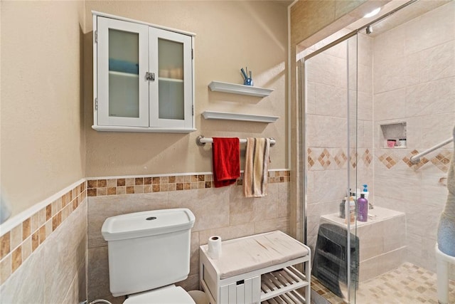 422502 E 1100th Rd, Checotah, OK 74426 - bathroom with tile walls, a shower stall, and wainscoting