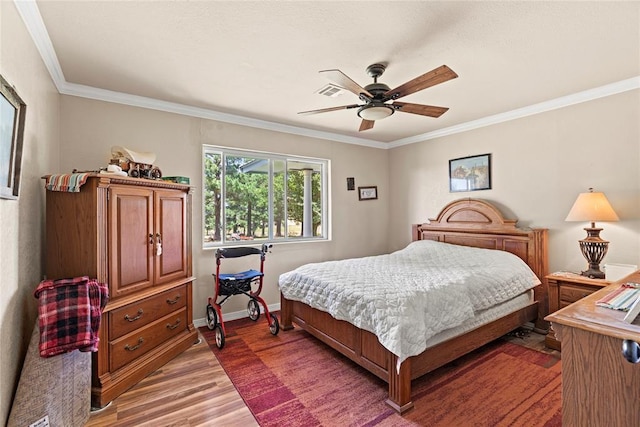422502 E 1100th Rd, Checotah, OK 74426 - bedroom with light wood-style flooring, ornamental molding, and a ceiling fan