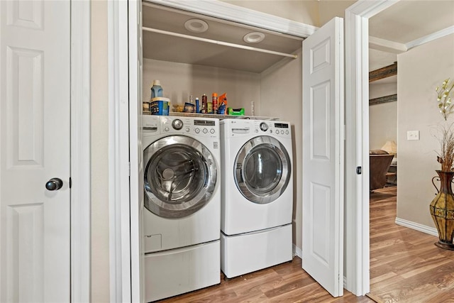 422502 E 1100th Rd, Checotah, OK 74426 - laundry area with washer and dryer and wood finished floors