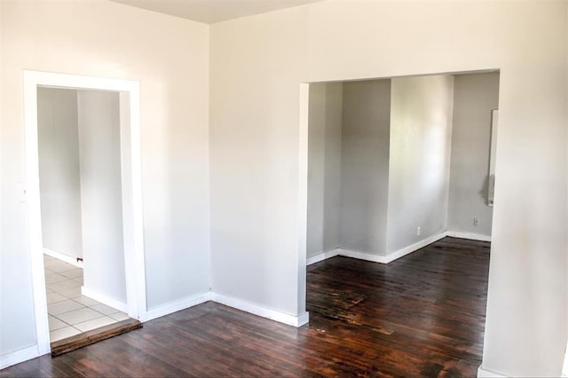 spare room featuring hardwood / wood-style flooring