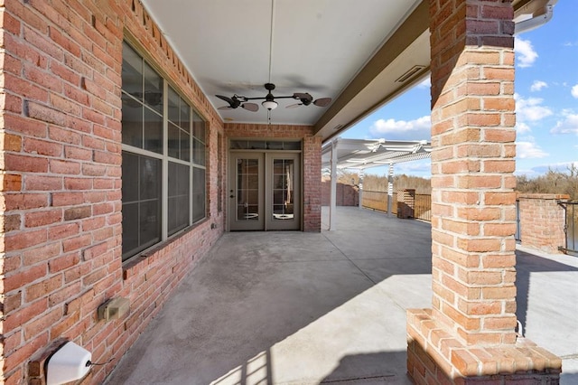 view of patio featuring ceiling fan and french doors