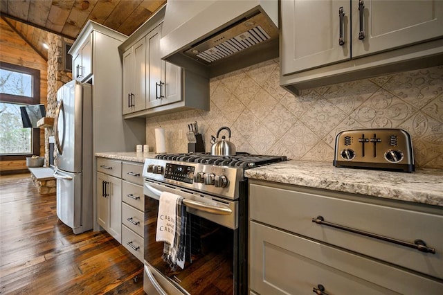 kitchen with custom exhaust hood, gray cabinets, light stone countertops, appliances with stainless steel finishes, and wood ceiling