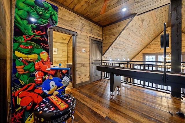 playroom with wooden walls, wood ceiling, and wood-type flooring