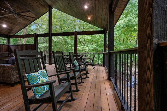 wooden deck featuring ceiling fan