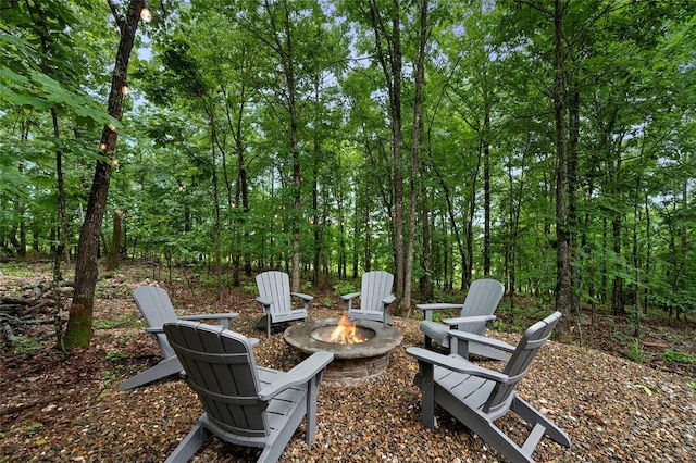 view of patio / terrace featuring an outdoor fire pit