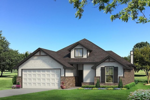 view of front of house with a front lawn and a garage