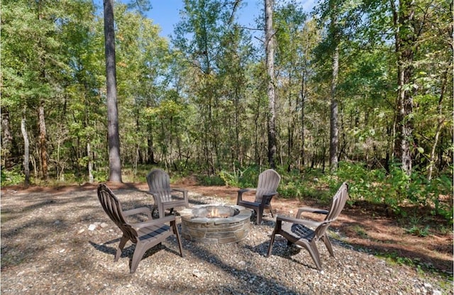 view of patio / terrace with an outdoor fire pit