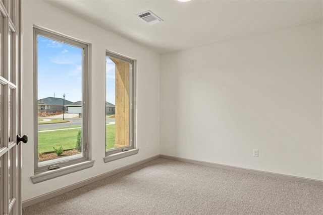 unfurnished room with carpet